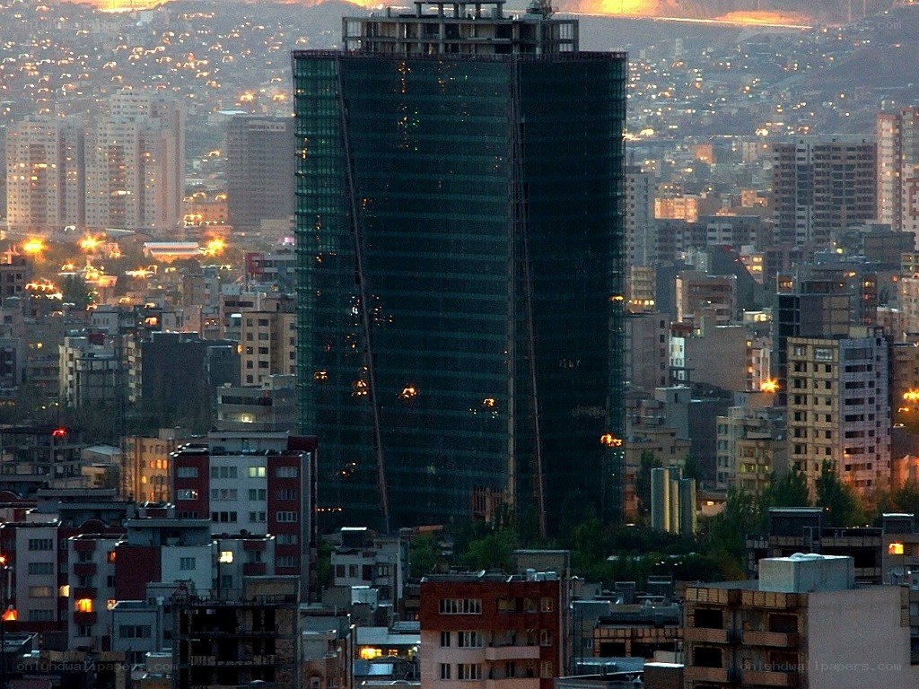 Skyscraper in a city at dusk