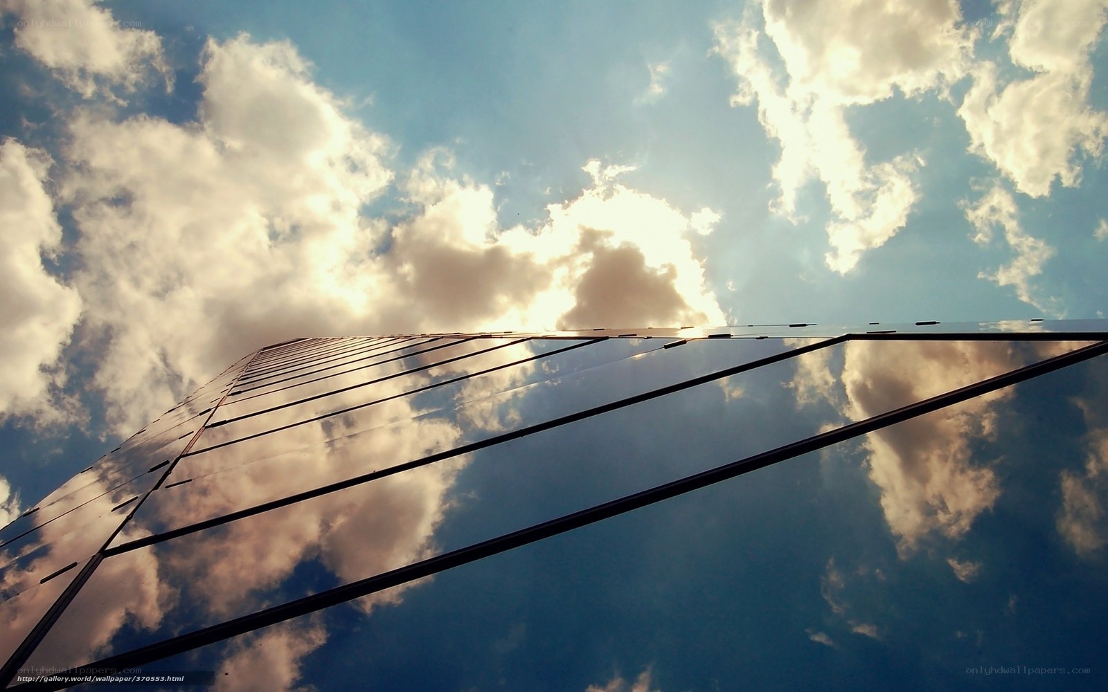 Skyscraper reflecting clouds