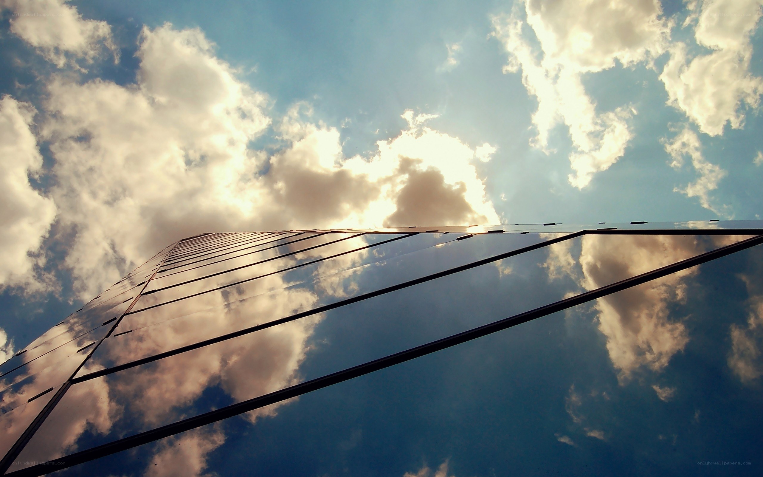 Skyscraper reflecting clouds