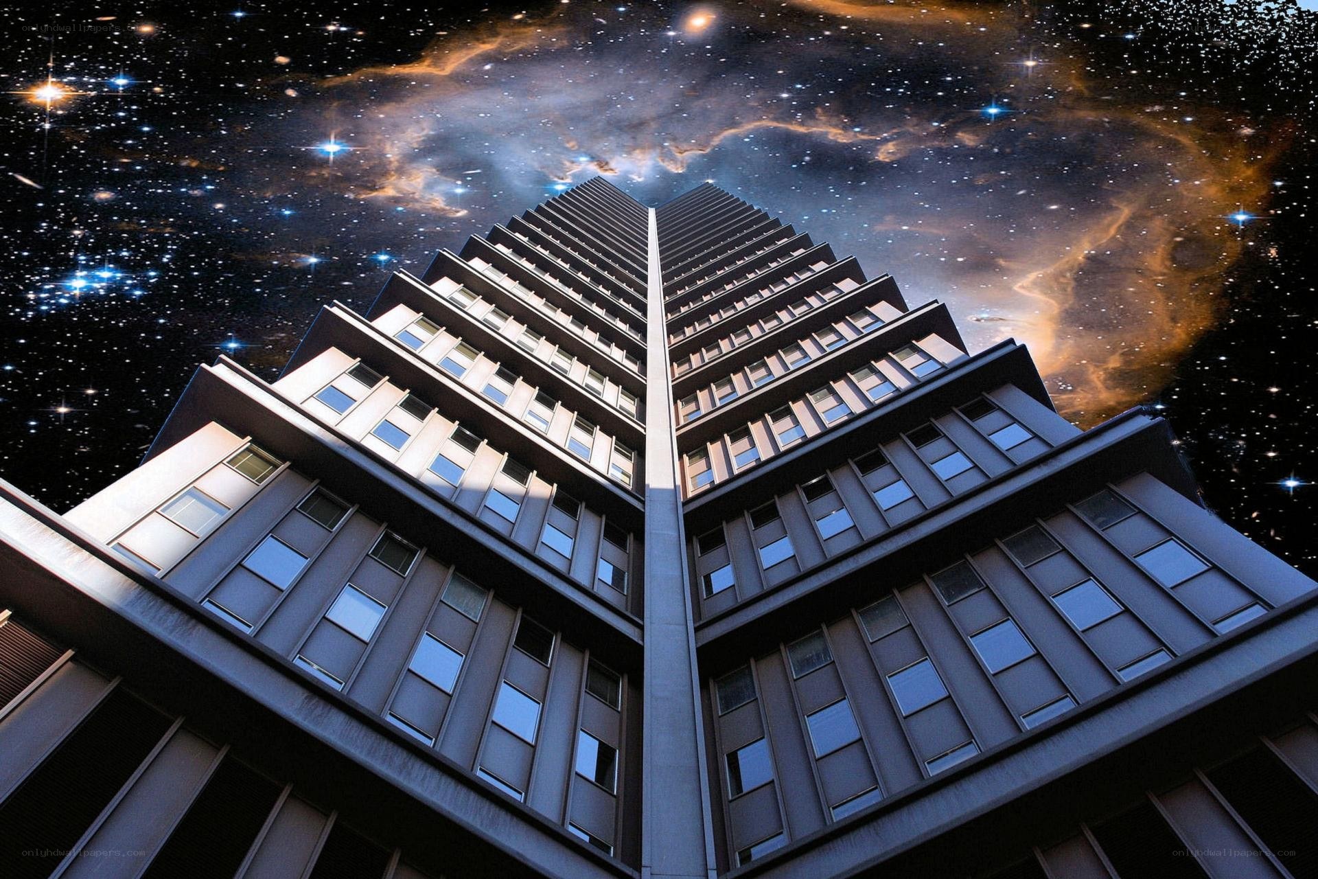 skyscraper under starry sky