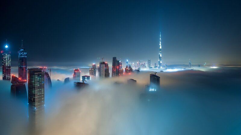 Skyscrapers Above Clouds — Blue, Dramatic, Night