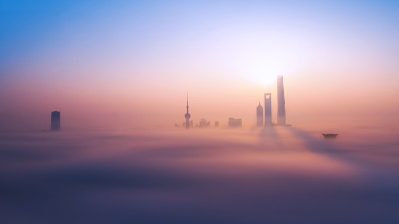 Skyscrapers Above Fog — Blue