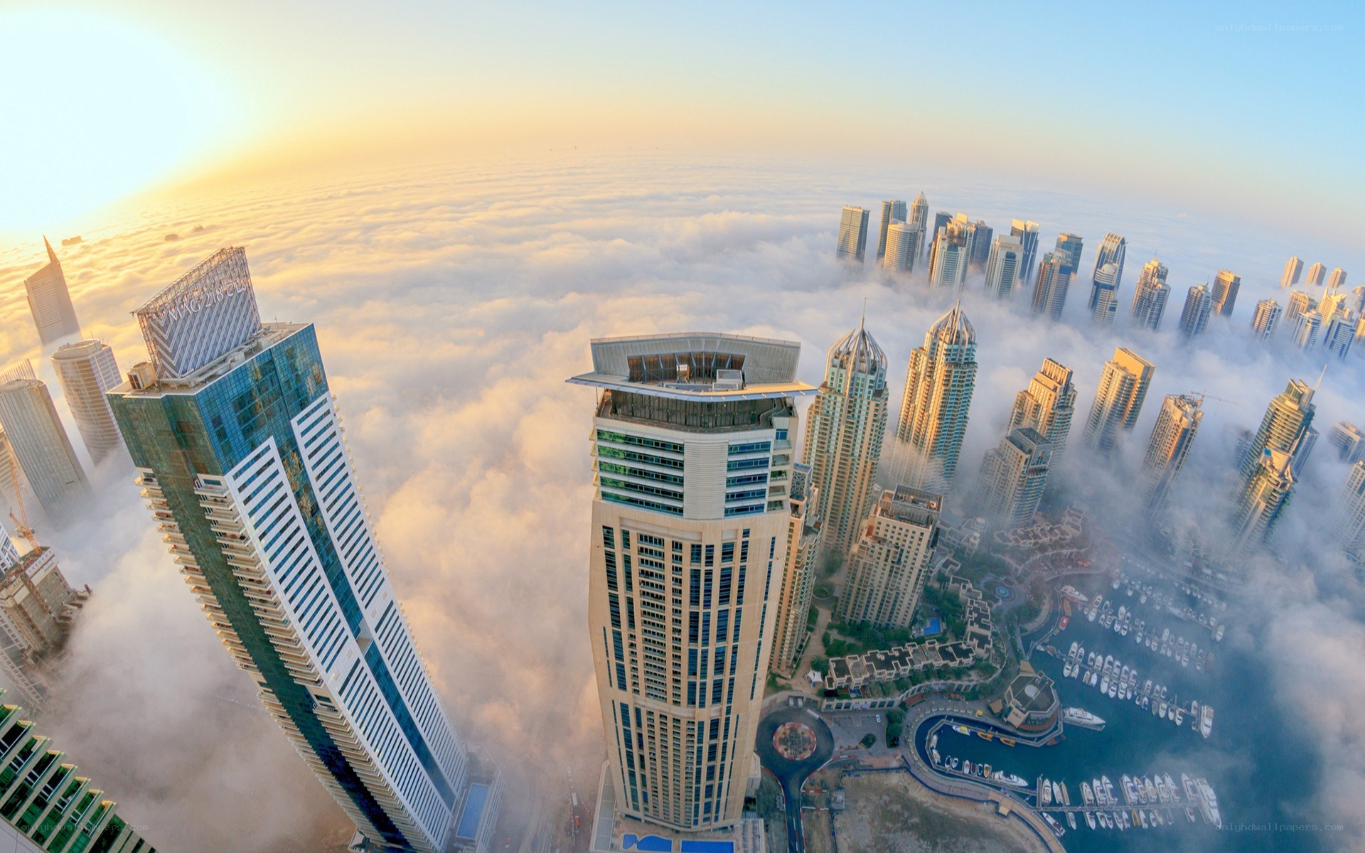 skyscrapers above the clouds