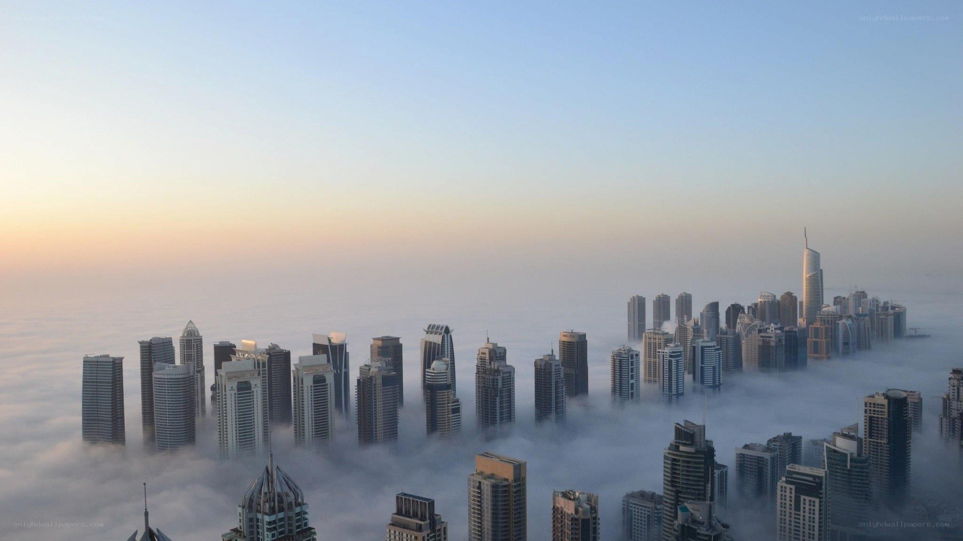 skyscrapers above the clouds