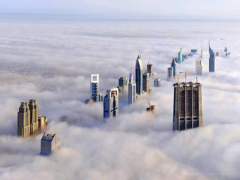 skyscrapers above the clouds