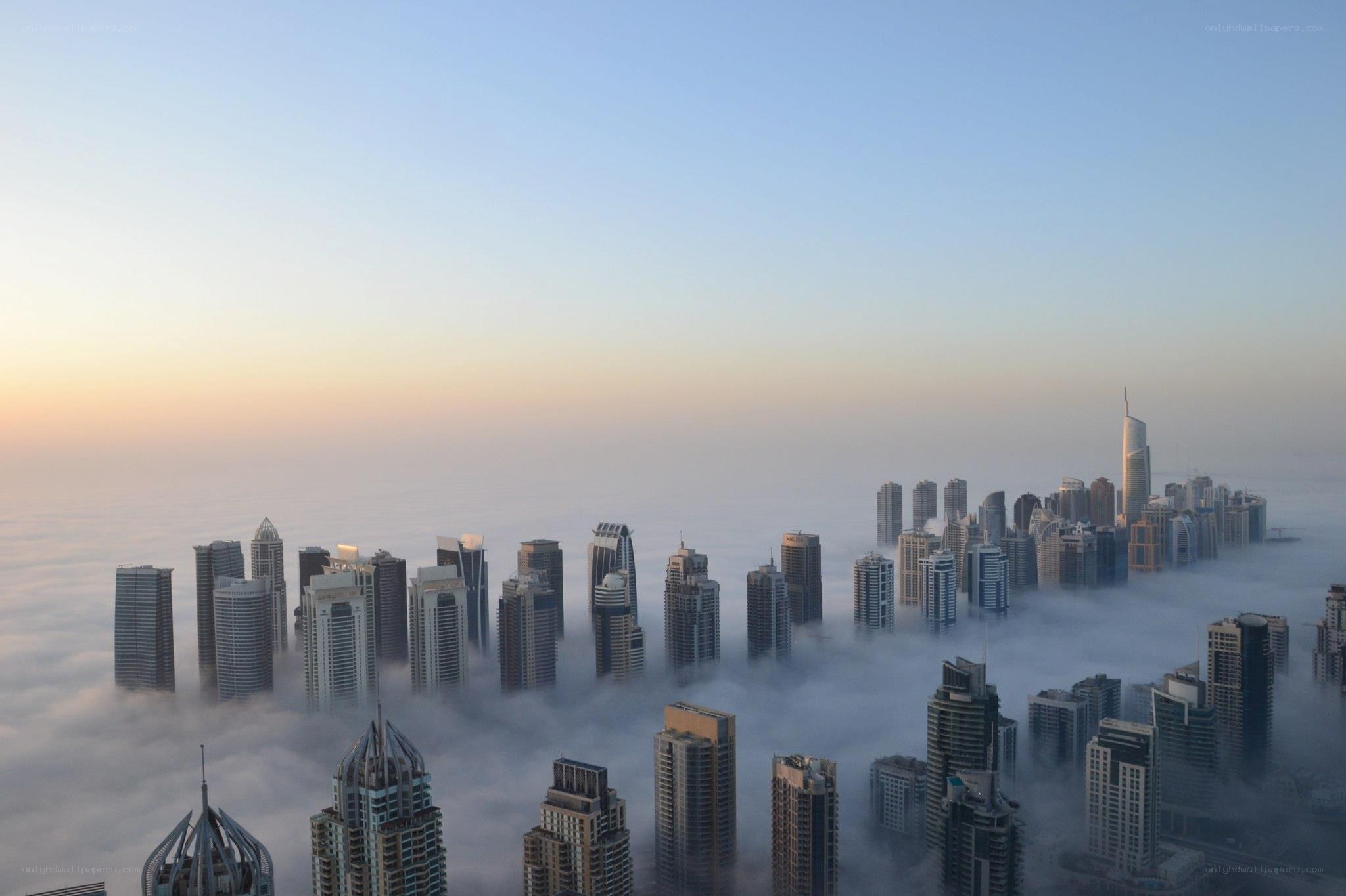 skyscrapers above the clouds