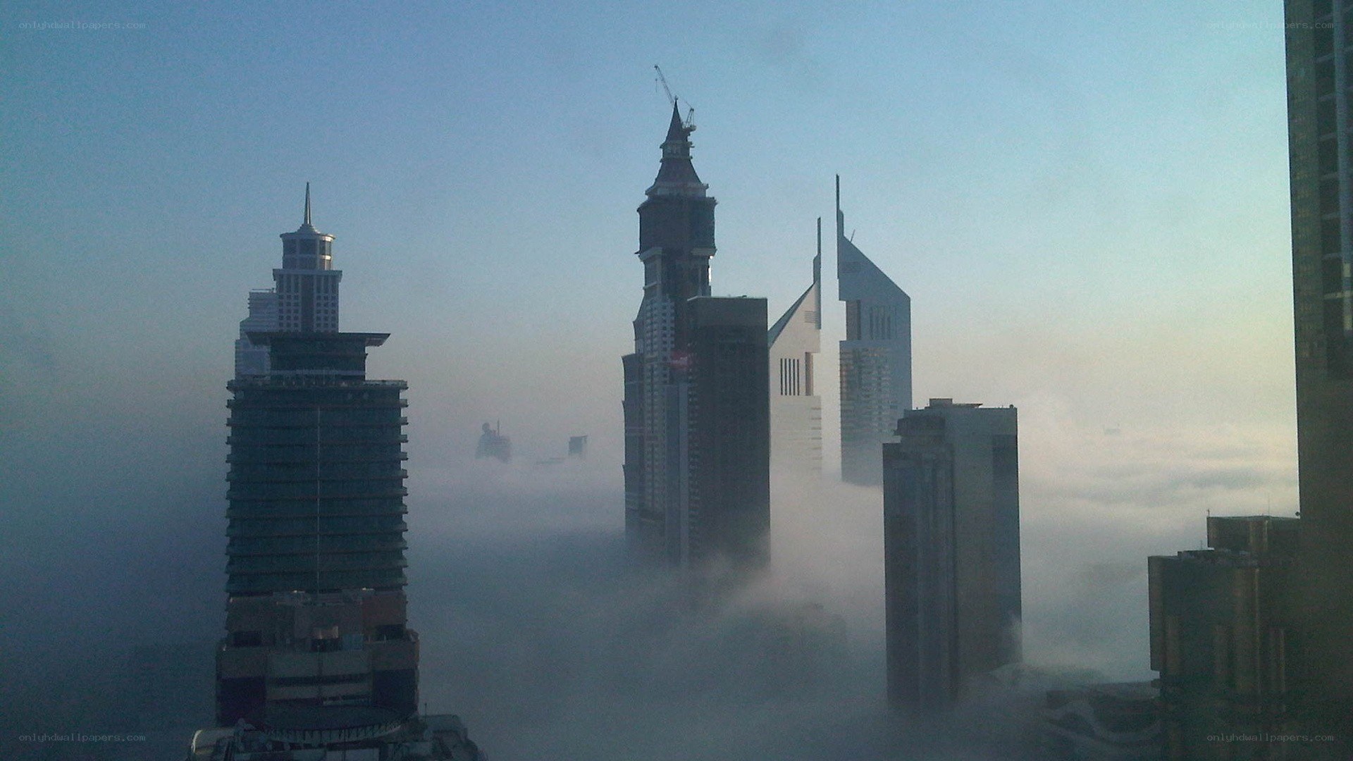 skyscrapers above the clouds