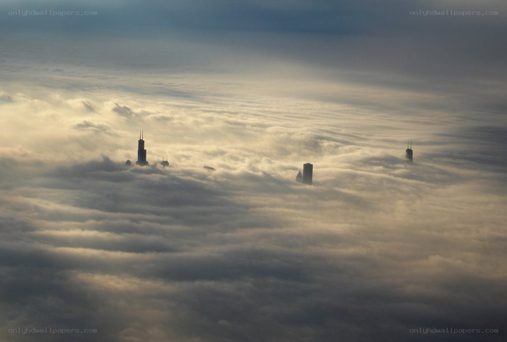skyscrapers above the clouds