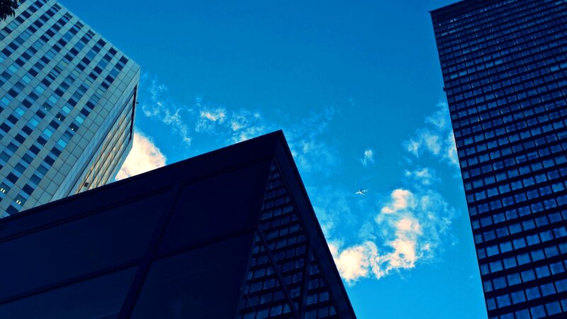 skyscrapers and airplane
