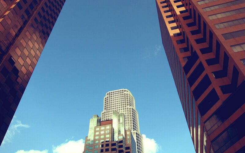 Skyscrapers in City — Blue, Dramatic, Afternoon, Photograph, Buildings, Sky, Clouds, Brown, White