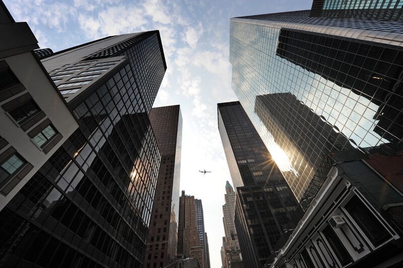 Skyscrapers in City — Gray, Dramatic, Afternoon, Photograph, Airplane
