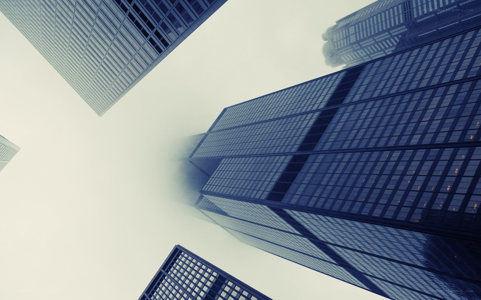 skyscrapers in fog