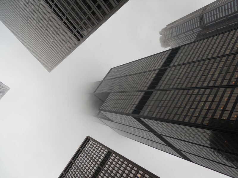 skyscrapers in fog