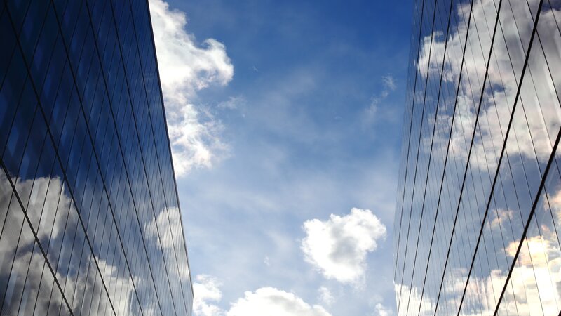 skyscrapers reflecting clouds
