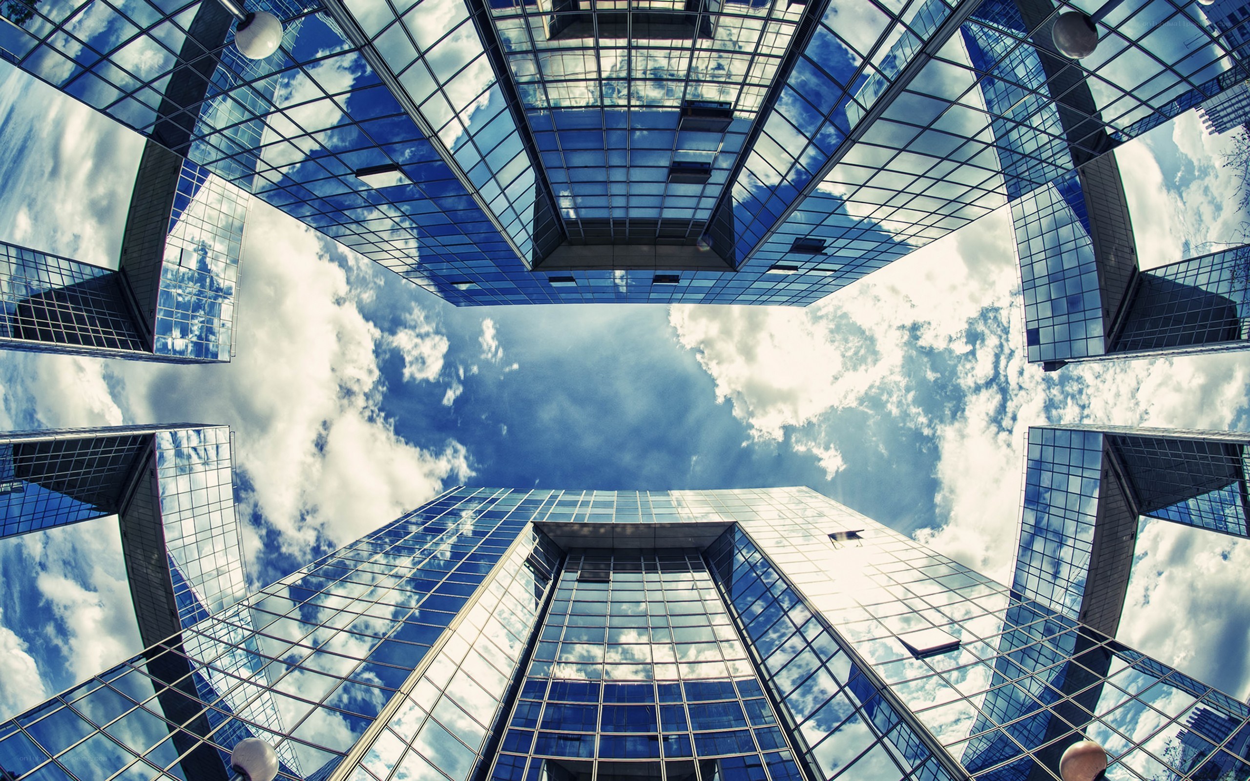 skyscrapers reflecting the sky