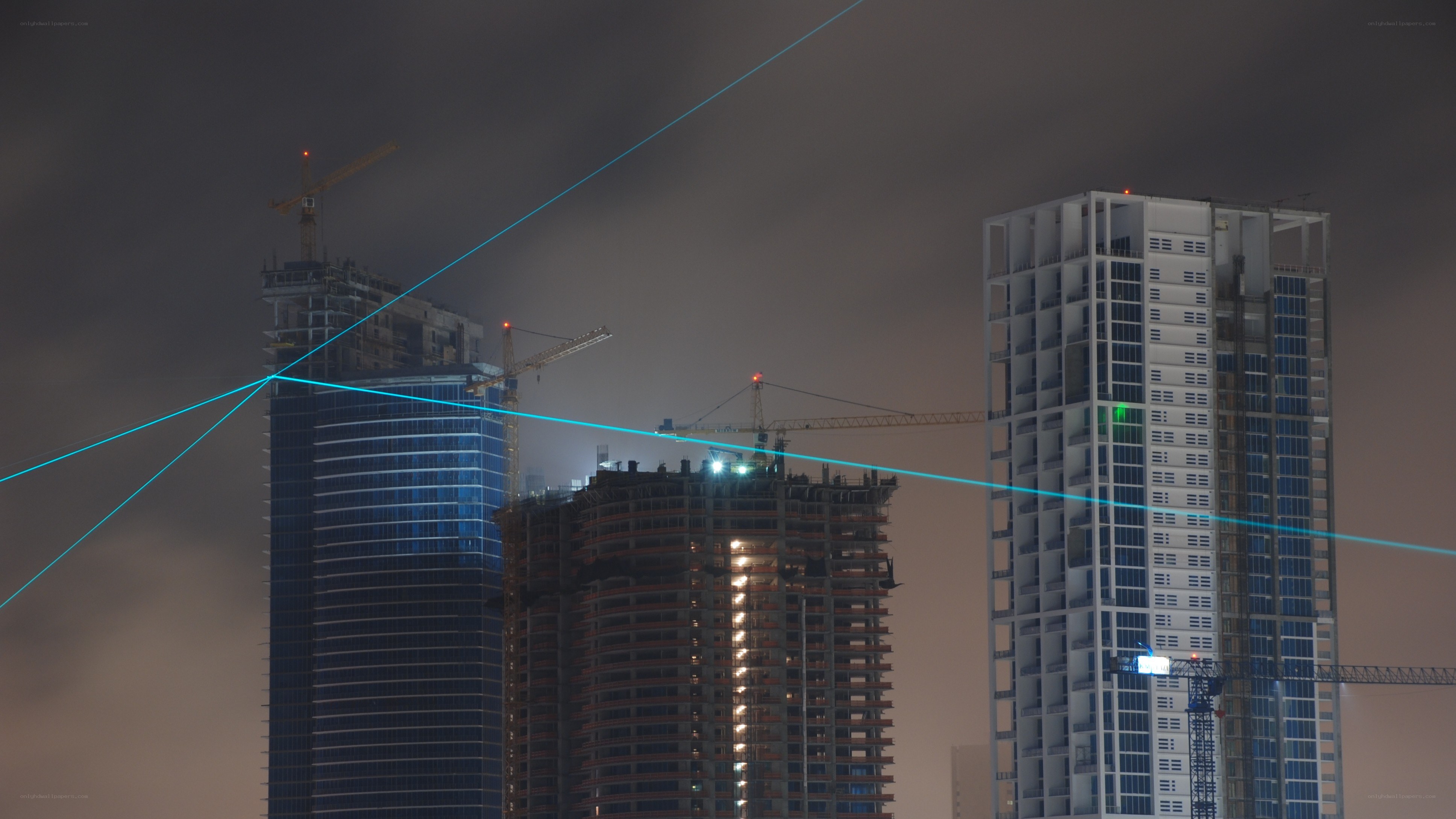 Skyscrapers under construction at dusk