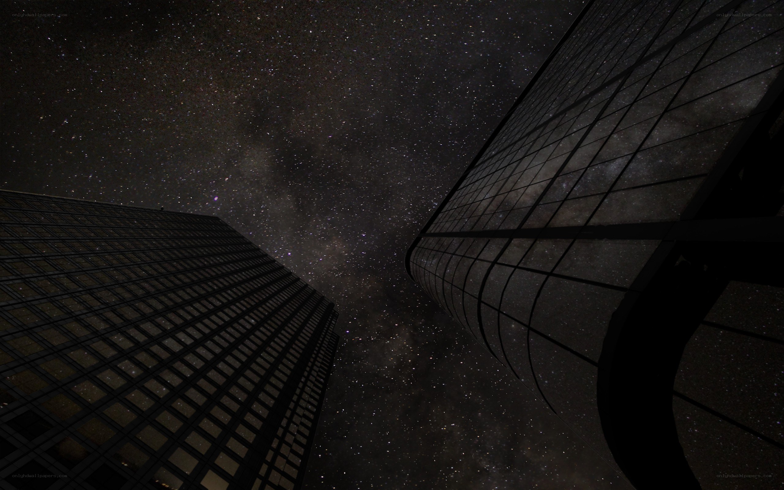 skyscrapers under starry sky