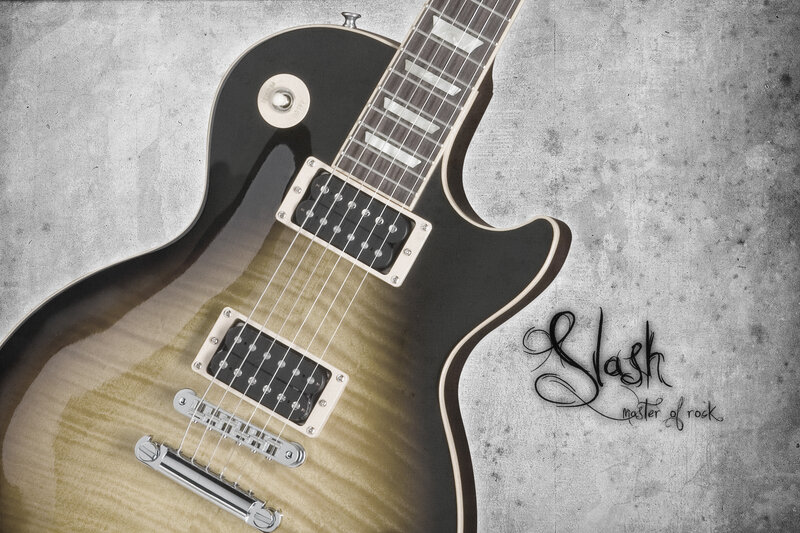 Slash electric guitar on concrete