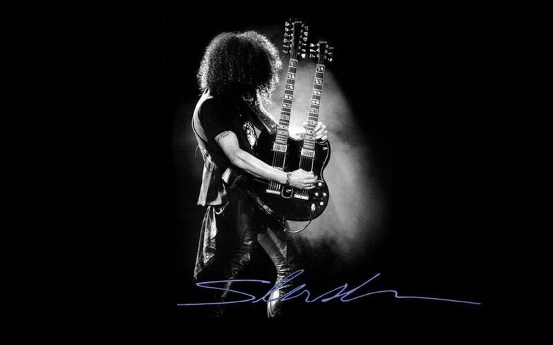 Slash performing on stage