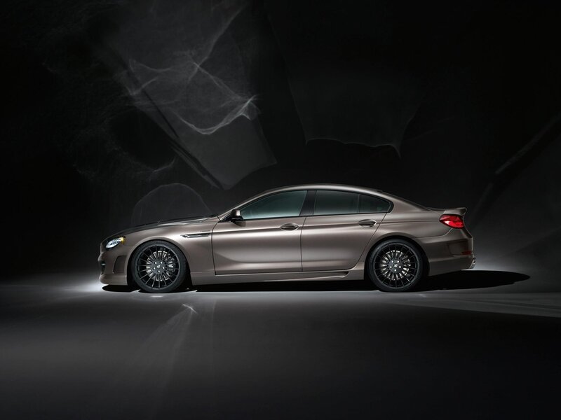 sleek brown sedan in studio