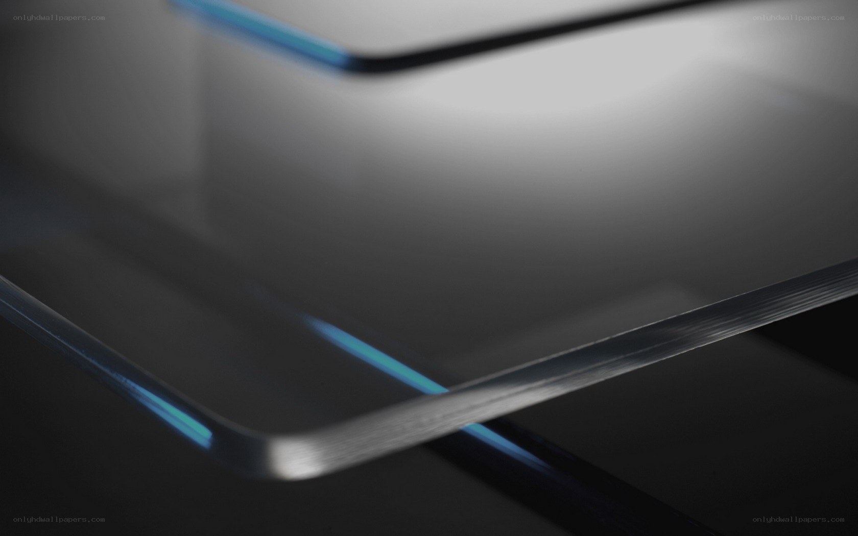 sleek glass surface with blue light