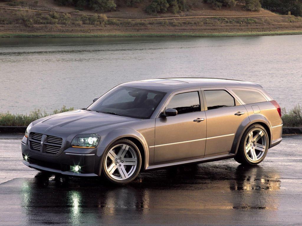 Sleek silver station wagon by water