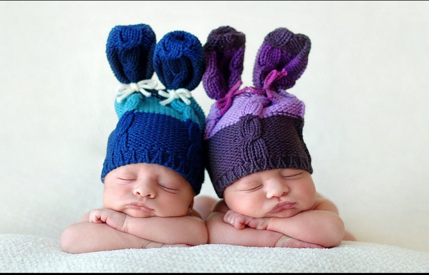 Sleeping babies in bunny hats