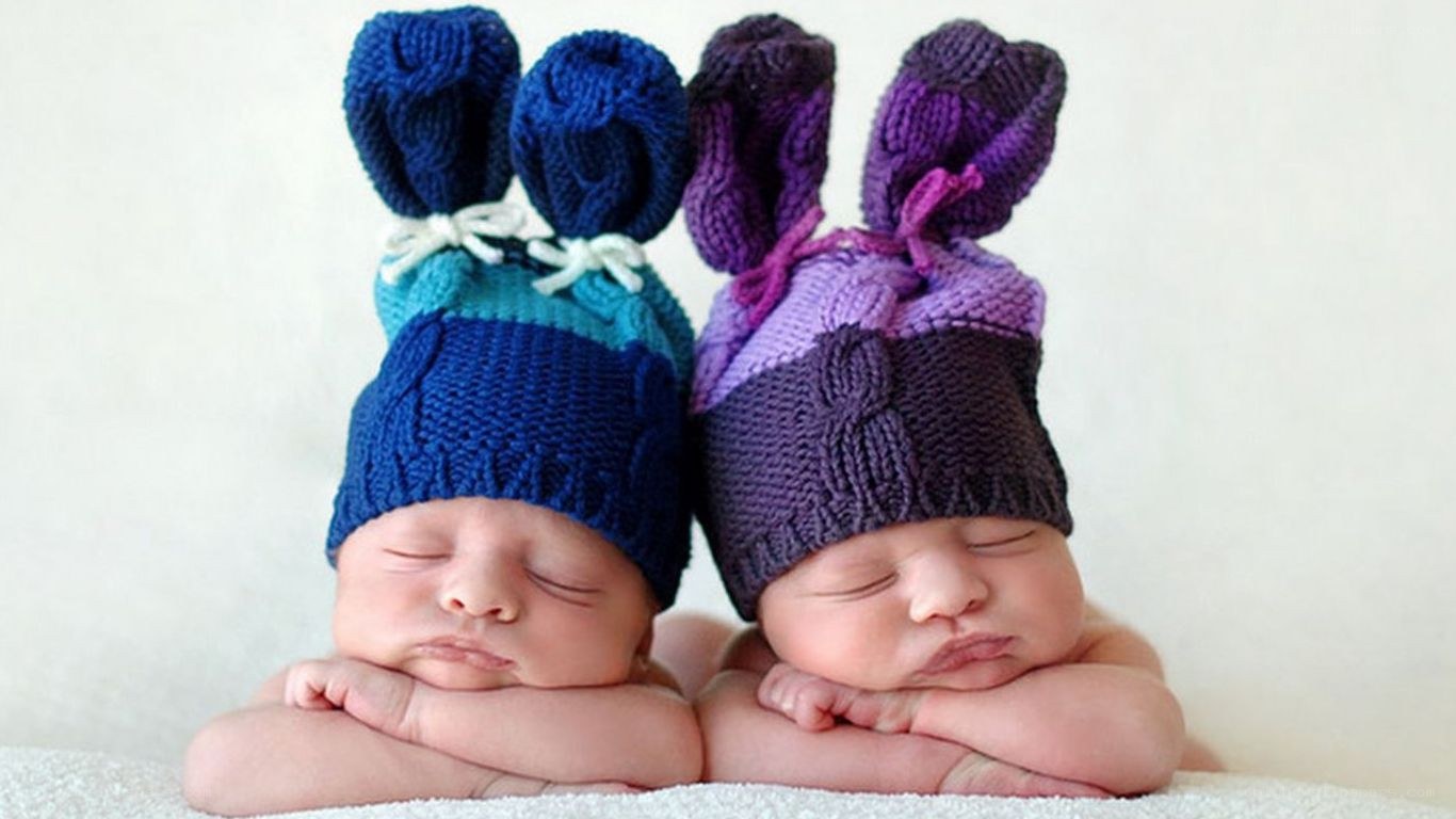 Sleeping babies in bunny hats