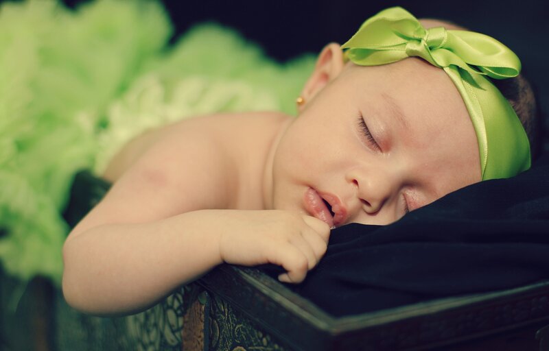 Sleeping Baby Girl — Green, Serene, Photograph