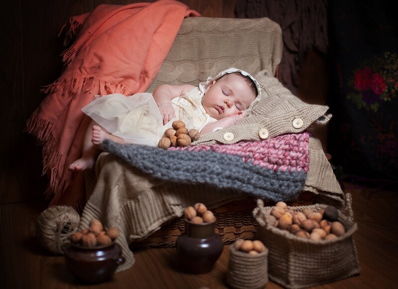 Sleeping Baby in Basket — Brown, Serene