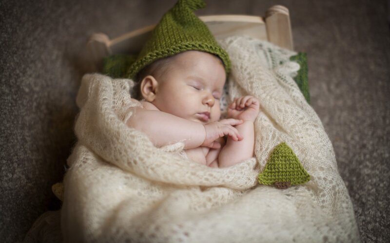 Sleeping Baby in Bed — Green, Serene