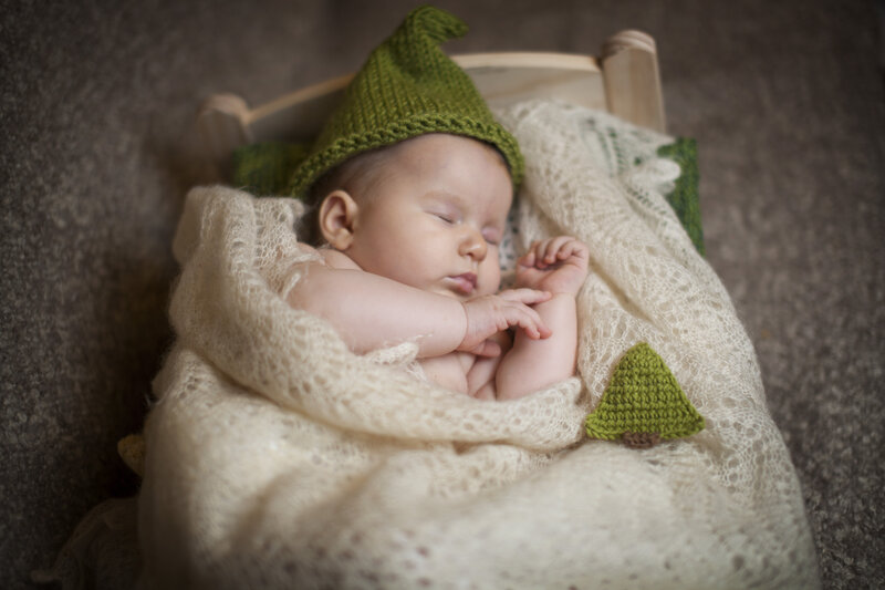 Sleeping Baby in Bed — Green
