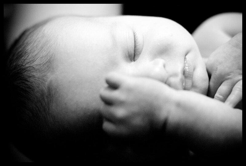 sleeping baby in black and white