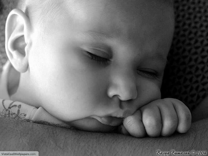 sleeping baby in black and white