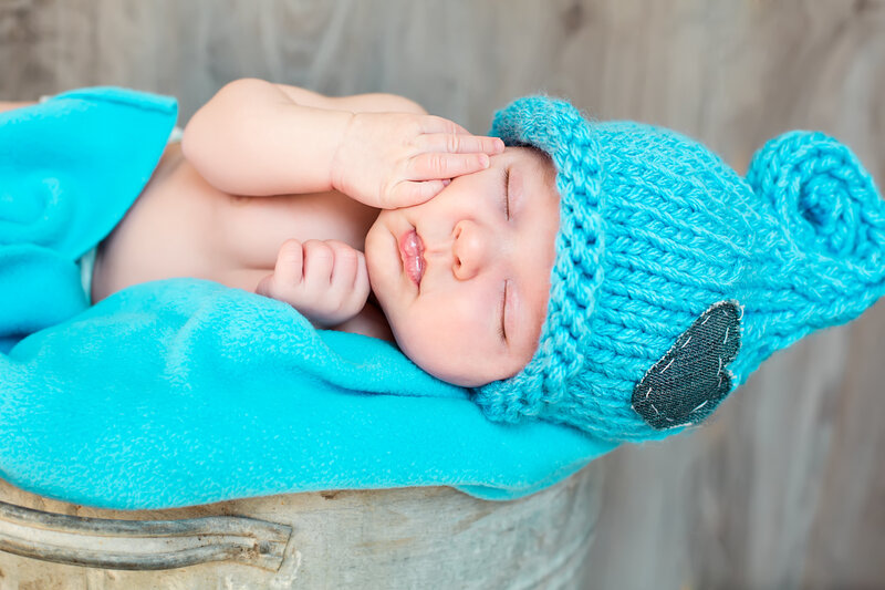 Sleeping Baby in Bucket