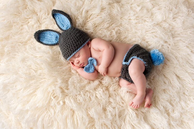 Sleeping Baby in Bunny Hat — White, Serene