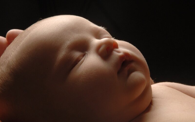 sleeping baby in soft light