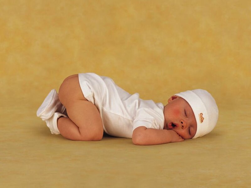 Sleeping Baby in White — Yellow