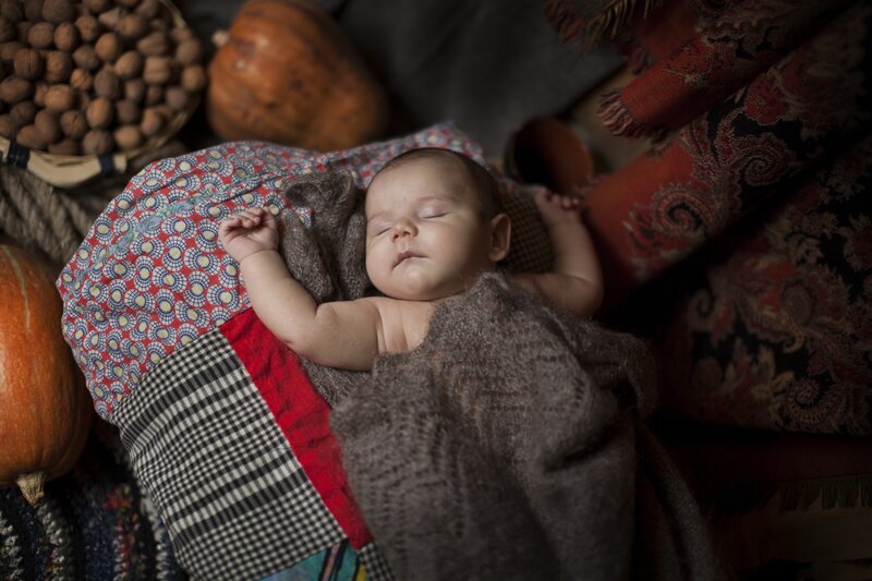 Sleeping Baby on Blanket — Brown
