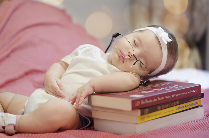 Sleeping Baby on Books