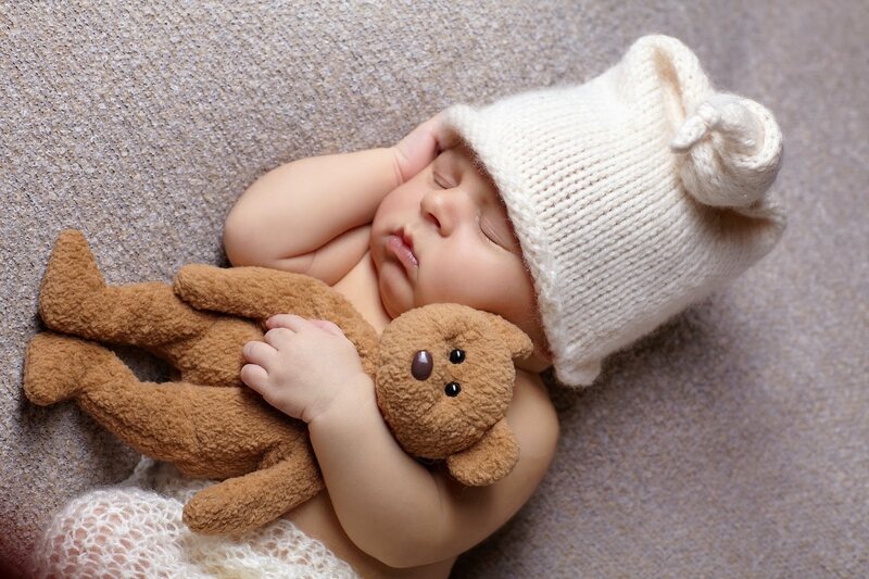 Sleeping Baby with Teddy Bear — Brown