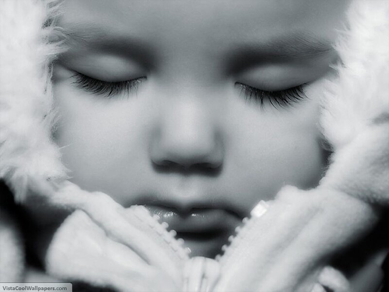 sleeping child in winter coat