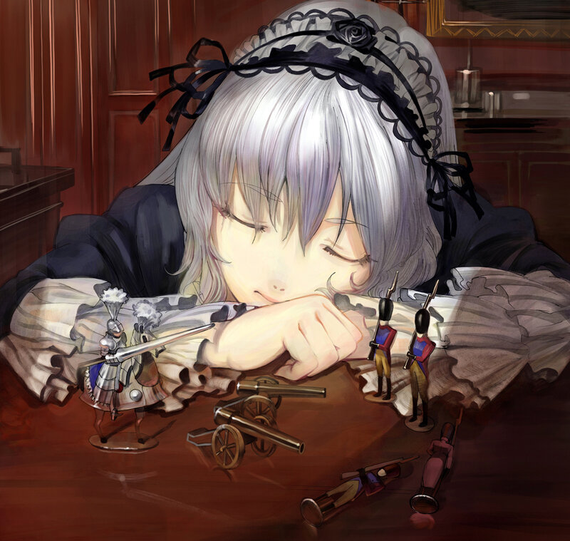 Sleeping girl with toy soldiers