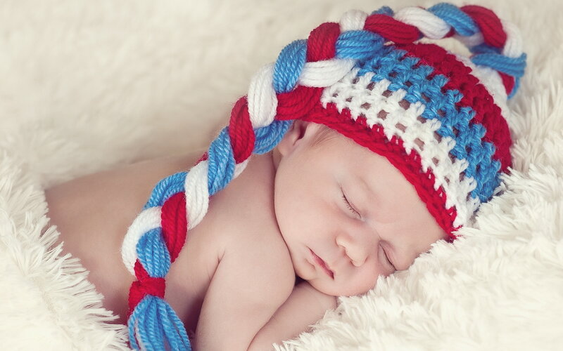 Sleeping Newborn Baby — Red, Serene