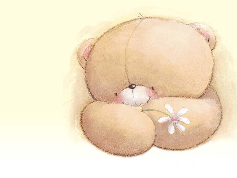 sleeping teddy bear with flower