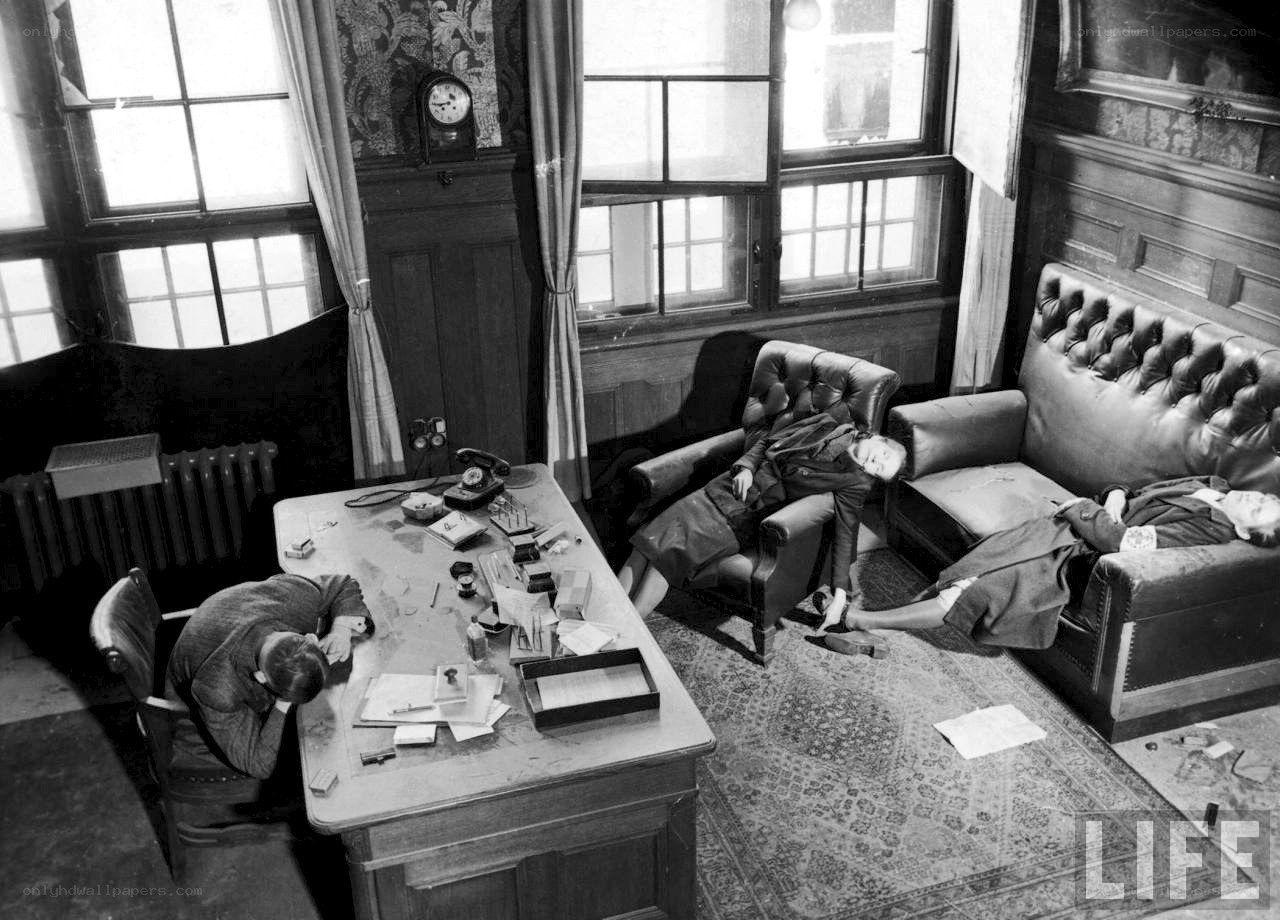 Sleeping workers in office