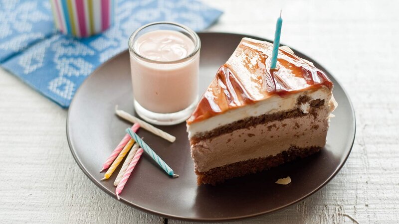 slice of cake with candle