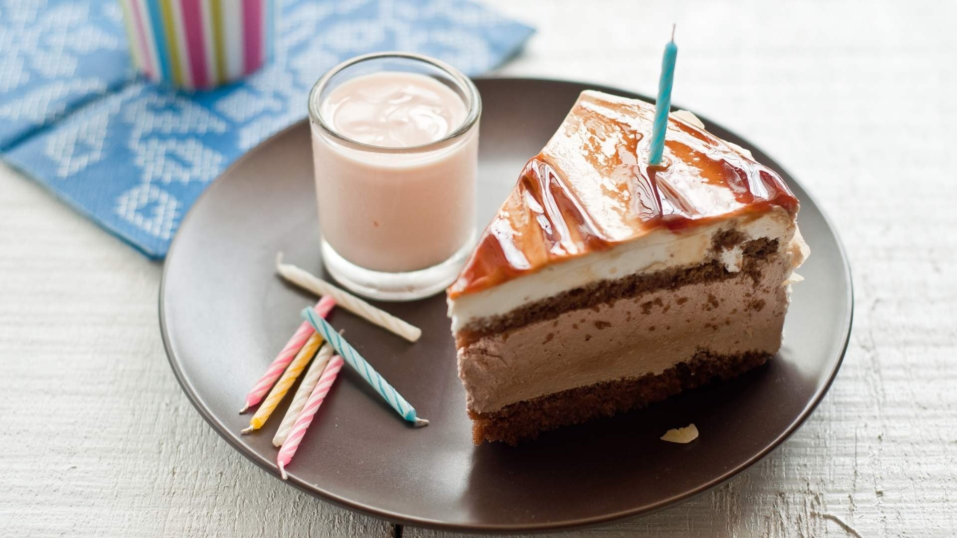 slice of cake with candle