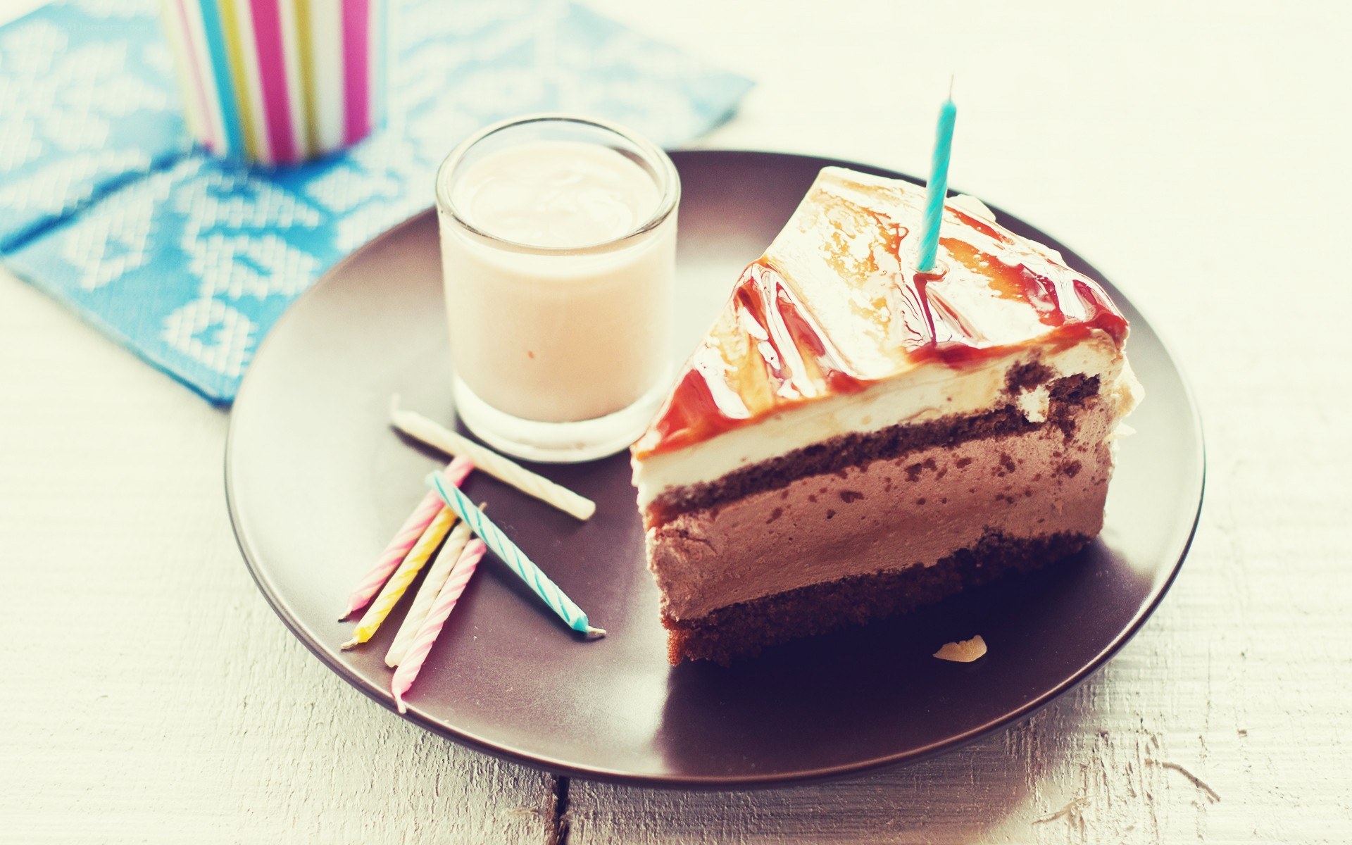 slice of cake with candle