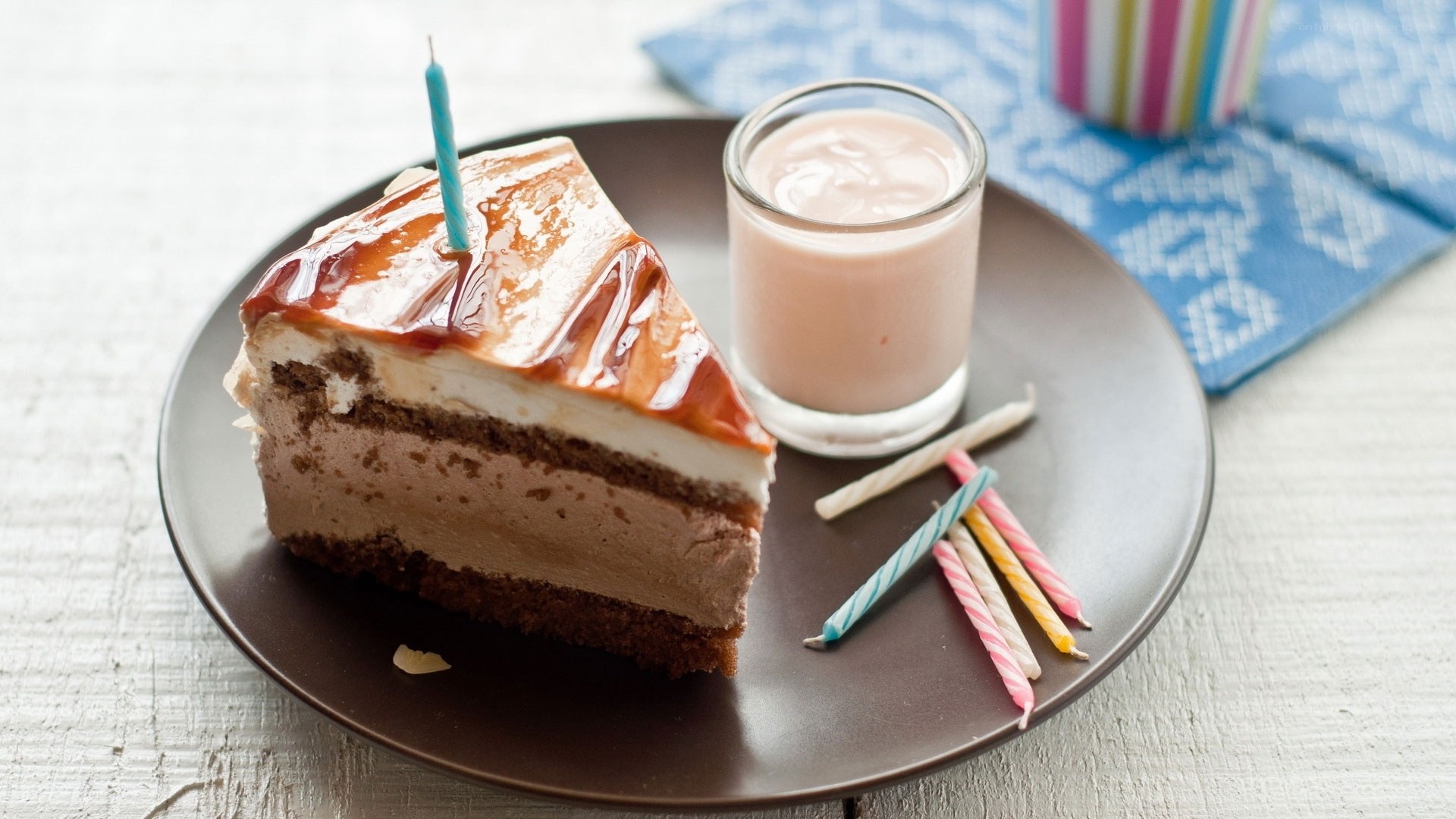 Slice of cake with candle